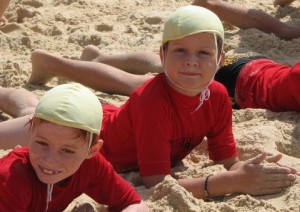 Hang out with people who motivate and inspire you. Nippers train together at an Australian Surf Life Saving Club.