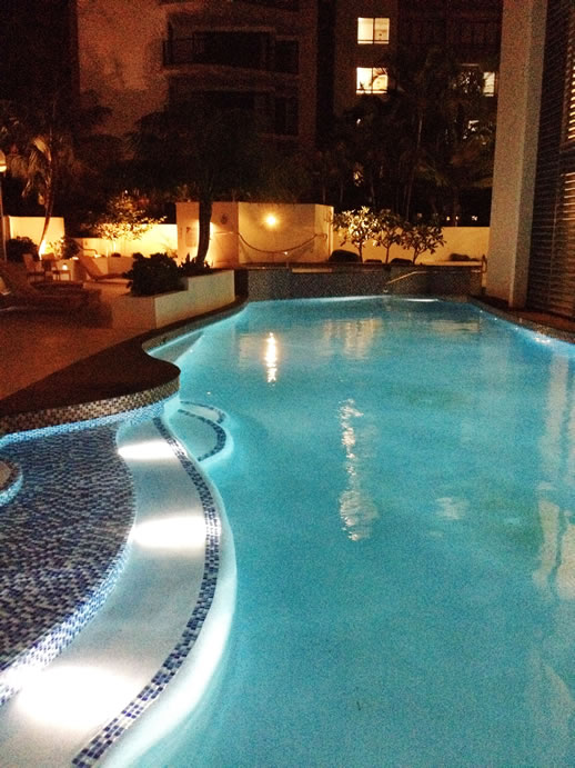 rumba resort caloundra pool by night blue